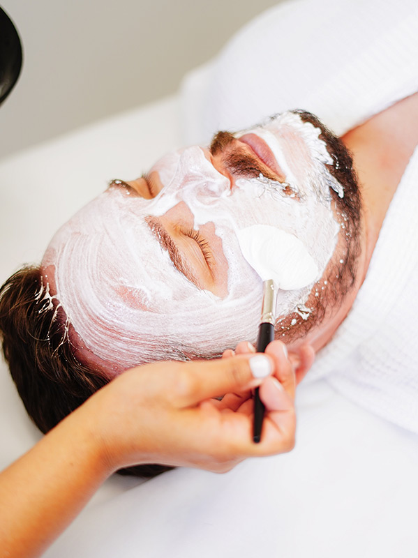 A facial mask being applied